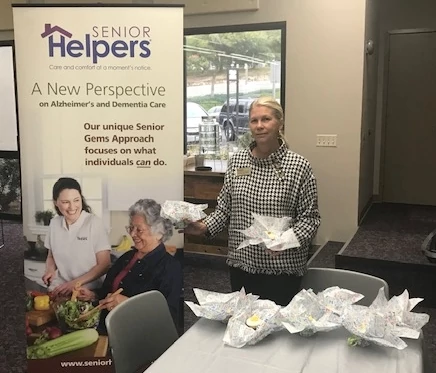 Senior Helpers Owner, Jennifer Fernandez, helping at a community event