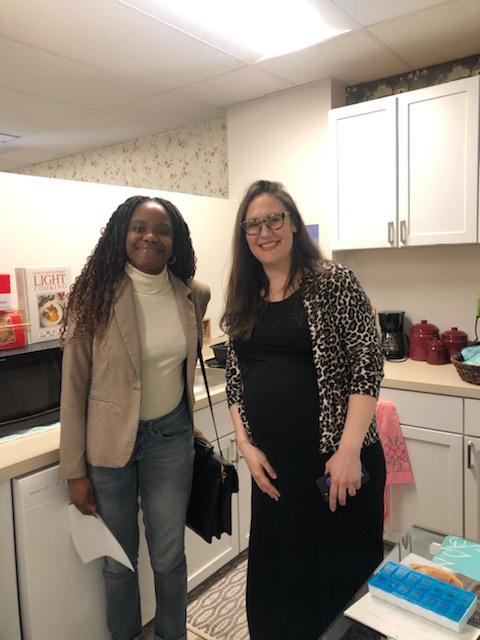  Rosemary giving a guest a tour of our Center for Caregiver Excellence at our Open House