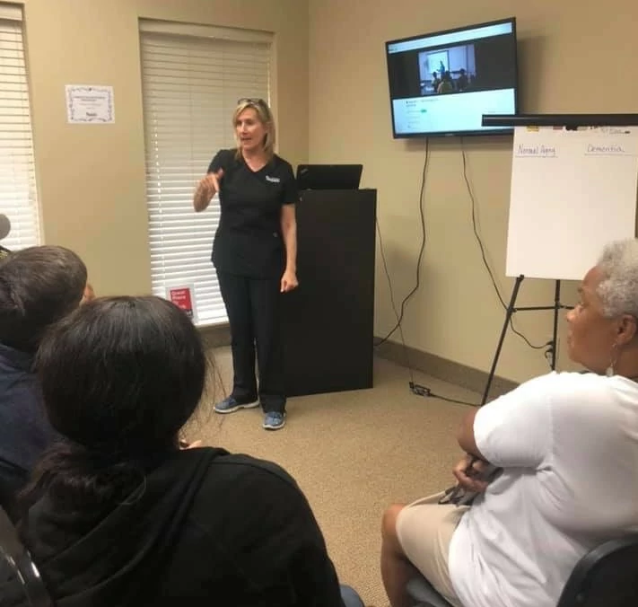 Owner, Janine, providing caregiver training