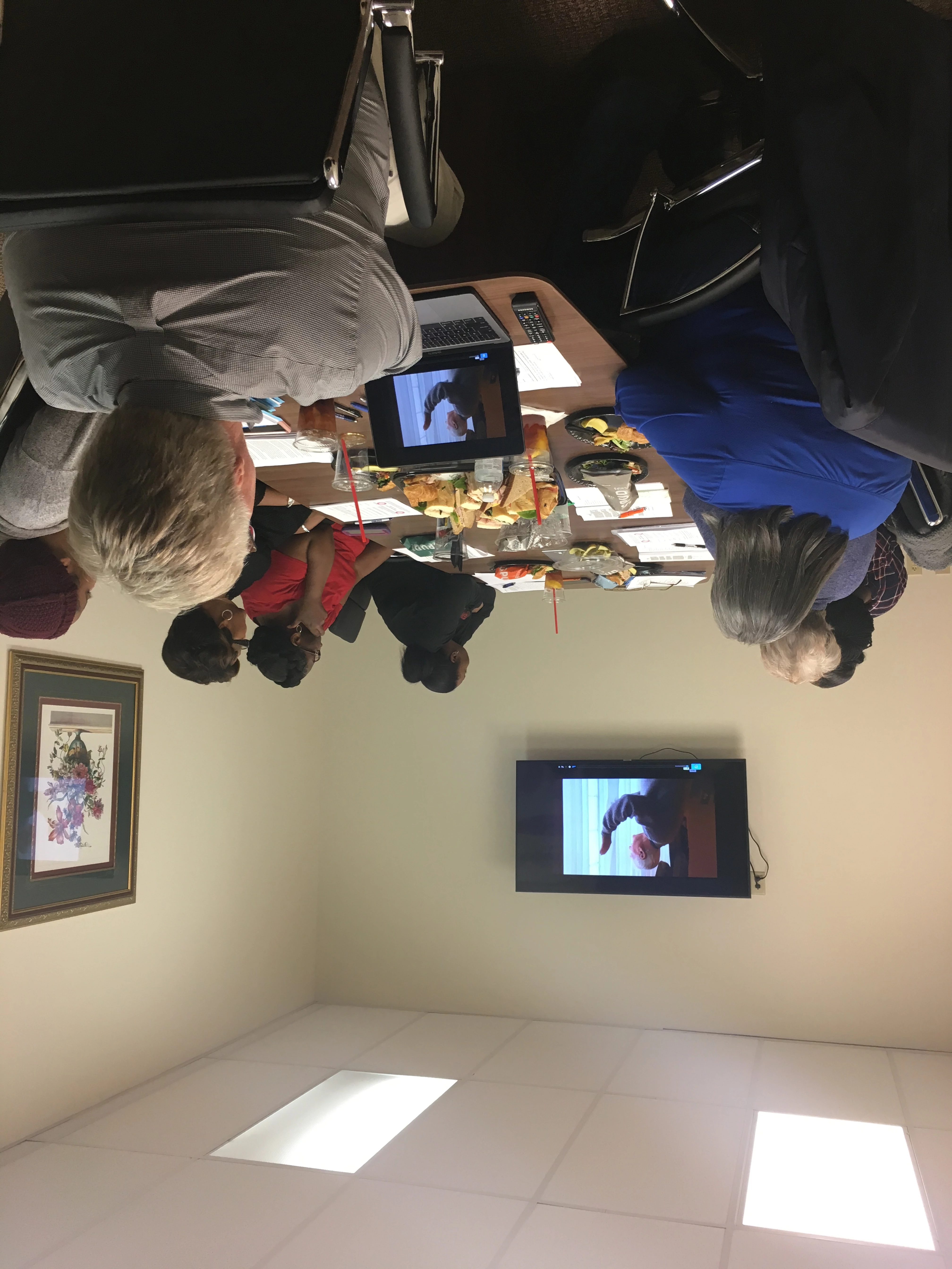 Owner Bill Bustin training a group of caregivers for in-home senior care