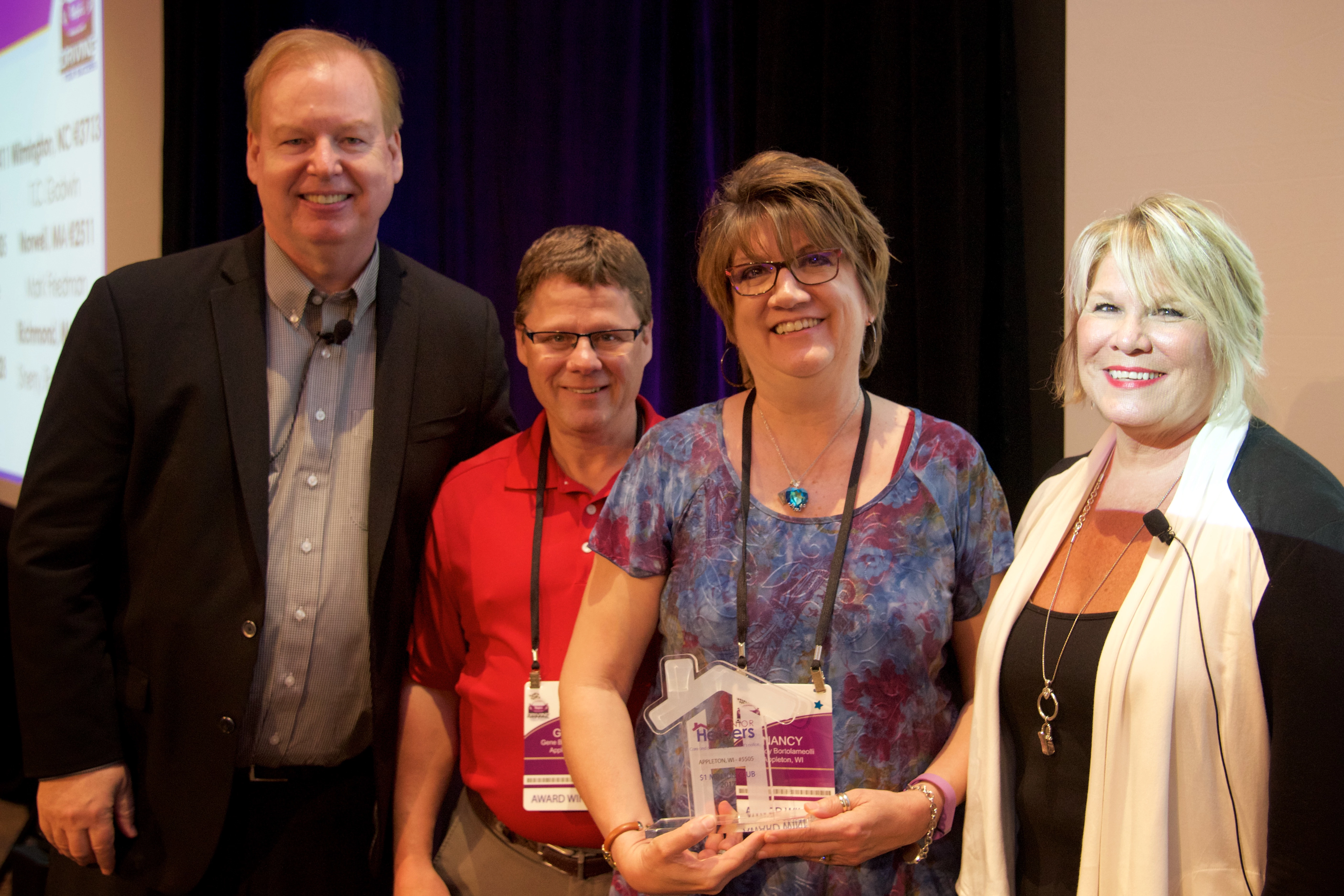: Senior Helpers Appleton owners Gene and Nancy Bortolameolli are presented with an award at Senior Helpers National Conference.