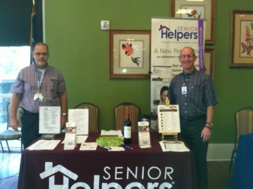 SeniorHelpers' Owner and Community Resource Coordinator displaying their services at Sun City in Indian Land, SC